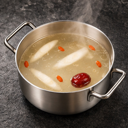 Classic Broth in a steaming individual hot pot