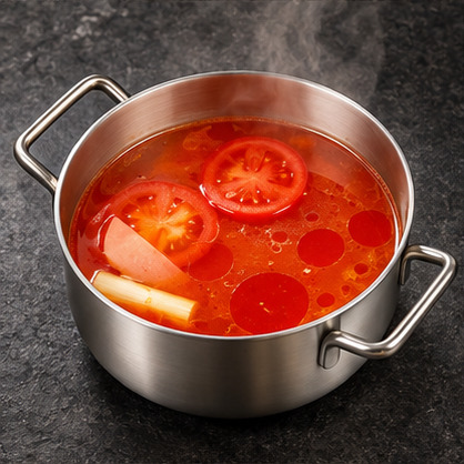 Tomato Broth in a steaming individual hot pot