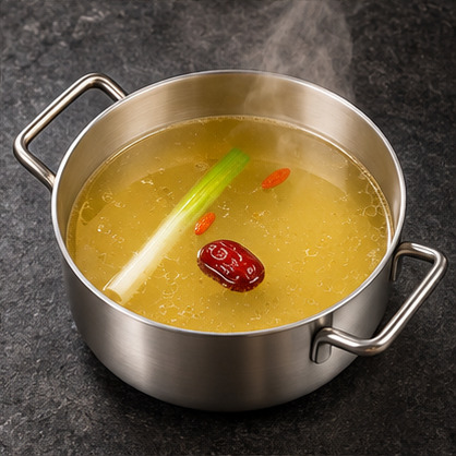 Chicken Broth in a steaming individual hot pot
