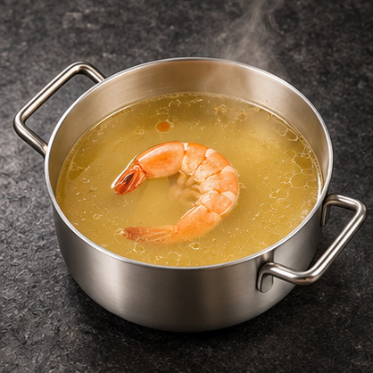 Seafood Broth in a steaming individual hot pot